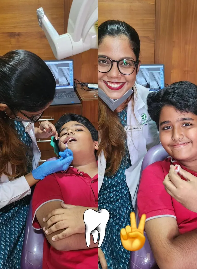 Dr Akhila Ashraf caring for a young patient at Vallamattam Dental Clinic